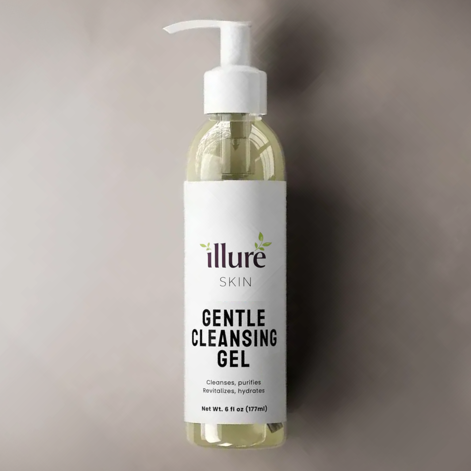 Gentle Cleansing Gel by Illure Skin in a clear bottle with a pump, surrounded by fresh green leaves.